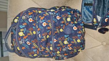 School rugzak met pennenzak

In set merk Kipling  beschikbaar voor biedingen