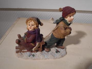 kerstfiguur M/J  met slee beschikbaar voor biedingen
