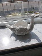 Witte bloempot zwaan, Ophalen