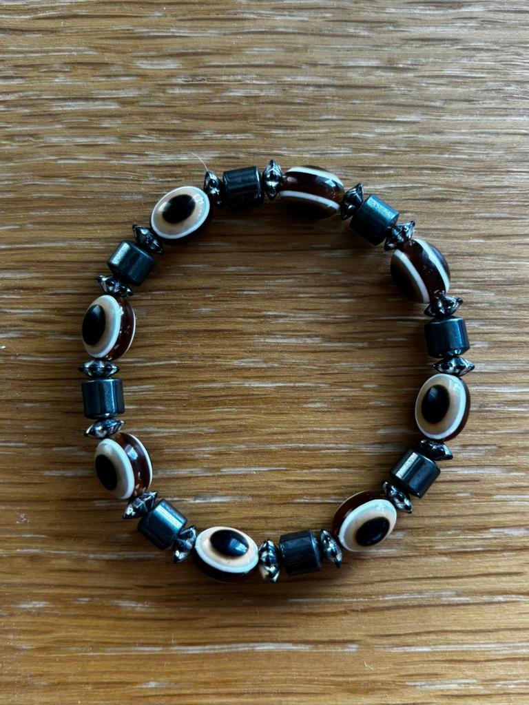 Armband met ogen, Enlèvement, Comme neuf