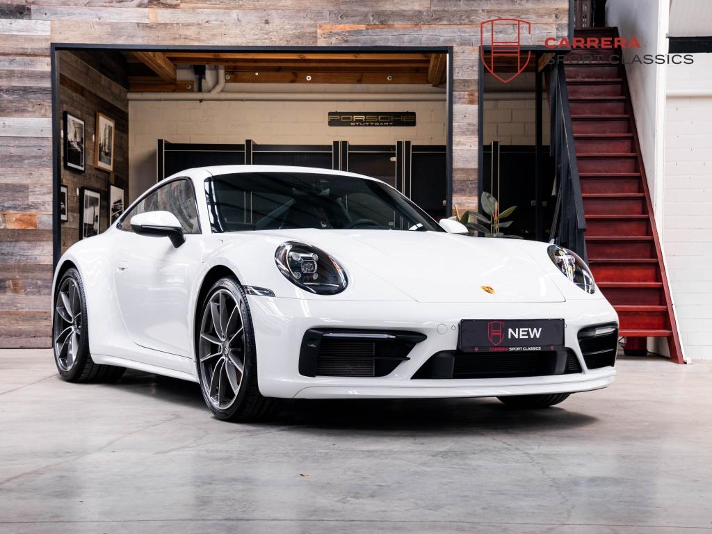 Porsche 911 992 Carrera Coupé 3.0 Carrera / Sport design /, Auto's, Automaat, 4 zetels, Gebruikt, Zwart