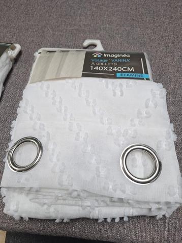 2 pakjes raamgordijnen beschikbaar voor biedingen