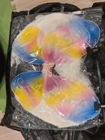 Vleugels vlinder gekleurd, Enlèvement, Comme neuf, Fille