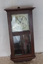 Oude houten klok, Ophalen