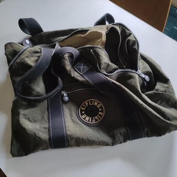 Kipling-tas (een ritssluiting stuk) beschikbaar voor biedingen