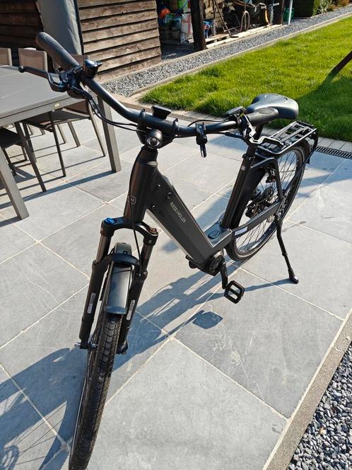 Riesse en Müller Nev04 Touring, Fietsen en Brommers, Elektrische fietsen, Zo goed als nieuw, Riese & Müller, 55 tot 59 cm, 50 km per accu of meer