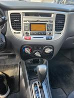 Automaat benzine Kia Rio 2009, airconditioning, vier nieuwe, Auto's, Kia, Te koop, Zilver of Grijs, Berline, Benzine