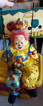 Clown op schommel, Ophalen