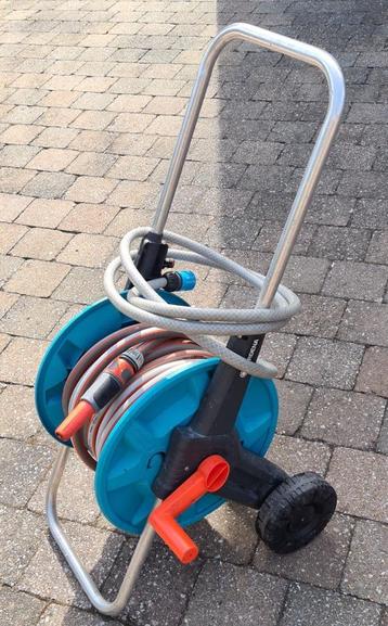 Zeer goede Gardena haspel.  20 meter gardena slag.  Sproeiko beschikbaar voor biedingen