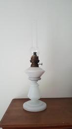 Oude olie lamp, Ophalen