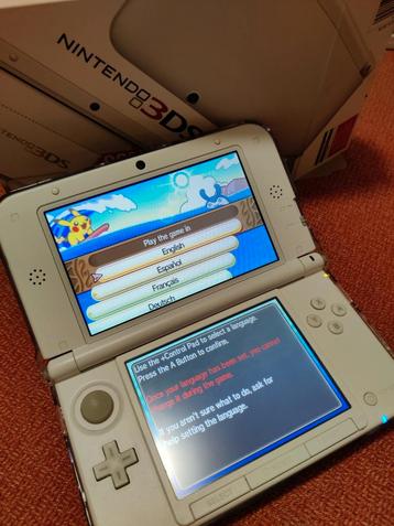 Witte Nintendo 3DS XL te koop met 5 games o.a. Pokémon!    beschikbaar voor biedingen