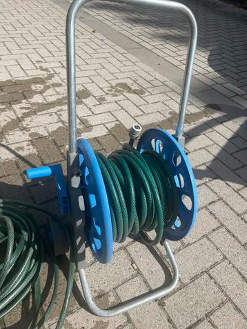 Haspel + extra tuinslang beschikbaar voor biedingen