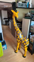 Girafe en papier mâché, Ophalen