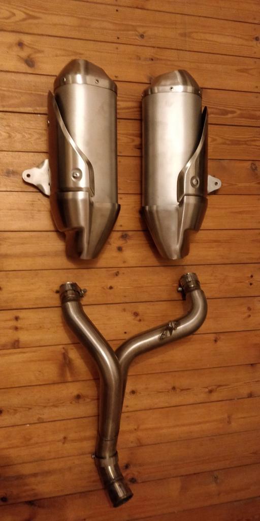 Origineel en nieuw uitlaat systeem Speed Triple 2011/2015, Motoren, Onderdelen | Overige, Ophalen of Verzenden