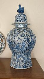 Blauw witte dekselvaas, Ophalen