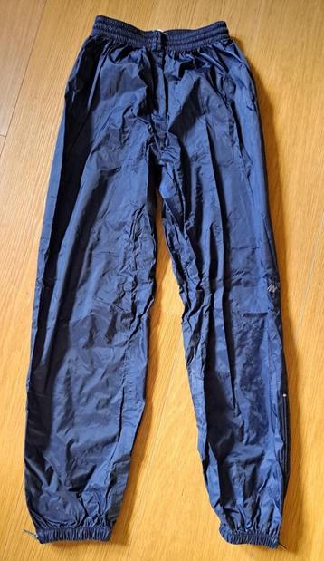 Quechua regenbroek 12 jaar oud — nieuw! beschikbaar voor biedingen