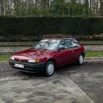 Mazda 323 - 1.6 benzine manueel - Oldtimer, Autos, Mazda, Rouge, 65 kW, Boîte manuelle, 5 places
