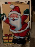 Kerstman ingekleurd met gekleurde verlichting, Ophalen