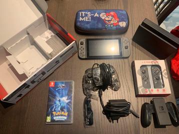 NINTENDO SWITCH 1 COMPLÈTE + accessoires beschikbaar voor biedingen