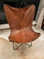 Vlinderstoel donker warm bruin , koeienhuid, Ophalen, Zo goed als nieuw, Bruin
