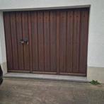 Porte garage sectionelle bois massif