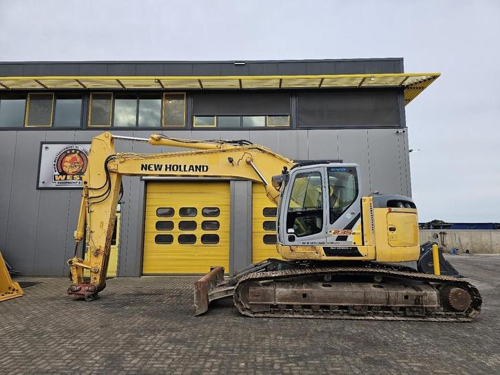 New Holland E235BSR-2 WE1537, Zakelijke goederen, Machines en Bouw | Kranen en Graafmachines, Graafmachine