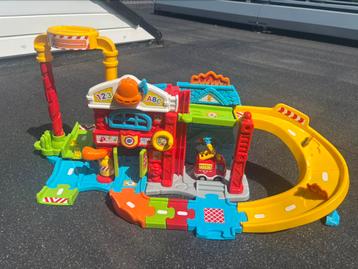VTech Toet Toet Auto’s Brandweerkazerne + Doos beschikbaar voor biedingen
