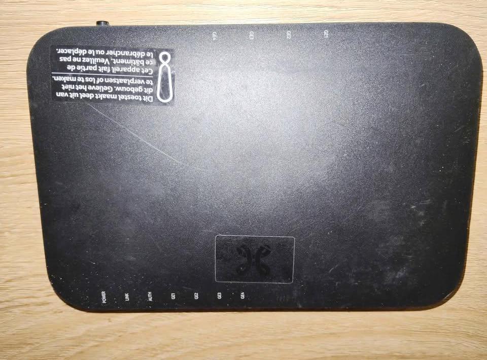 Nokia G-040G-A glasvezel modem, Ophalen of Verzenden, Gebruikt, Router met modem