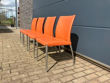 4x Jori Mikono eetkamerstoelen, oranje leder Topstaat!! Zgan beschikbaar voor biedingen