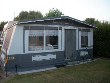 Wintervoortent met caravan en inboedel beschikbaar voor biedingen