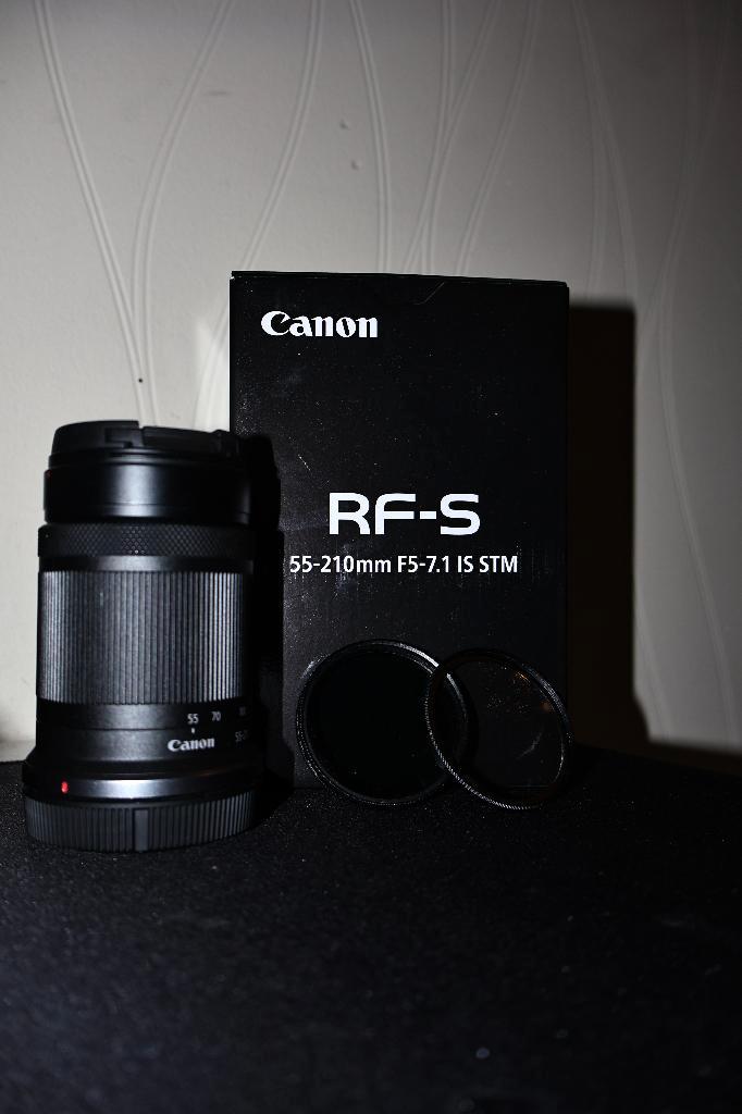 Canon RF-S 55—210 mm f/5‑7.1 IS STM + UV- en CPL-filters+kap, Audio, Tv en Foto, Foto | Lenzen en Objectieven, Zo goed als nieuw