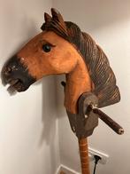 Oud stokpaart hout met ijzeren wielen., Ophalen