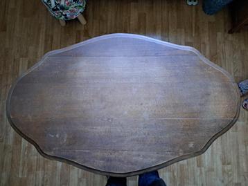 Table ovale en bois pied central