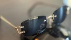 Cartier zonnebril met zwart glas, Handtassen en Accessoires, Zonnebrillen en Brillen | Dames, Overige merken, Zonnebril, Zwart