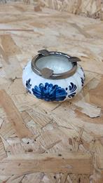 Cendrier en porcelaine bleu de Delft, Enlèvement