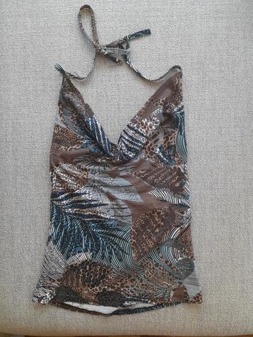 Zomertop, met open rug en decolleté en palmen/blaren print  beschikbaar voor biedingen