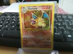 Charizard 4/102 Holo Zeldzaam, Hobby en Vrije tijd, Ophalen of Verzenden, Zo goed als nieuw, Booster