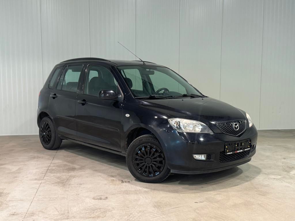 Mazda 2 / 170.000 km / benzine 1.2 / 2003 / carpass/, Autos, Mazda, Entreprise, Radio, Essence, Boîte manuelle, Enlèvement