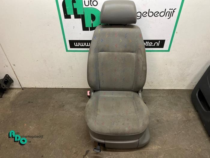 Stoel links van een Volkswagen Caddy (Caddy 04-), Auto-onderdelen, Interieur en Bekleding, Volkswagen, Gebruikt, 3 maanden garantie