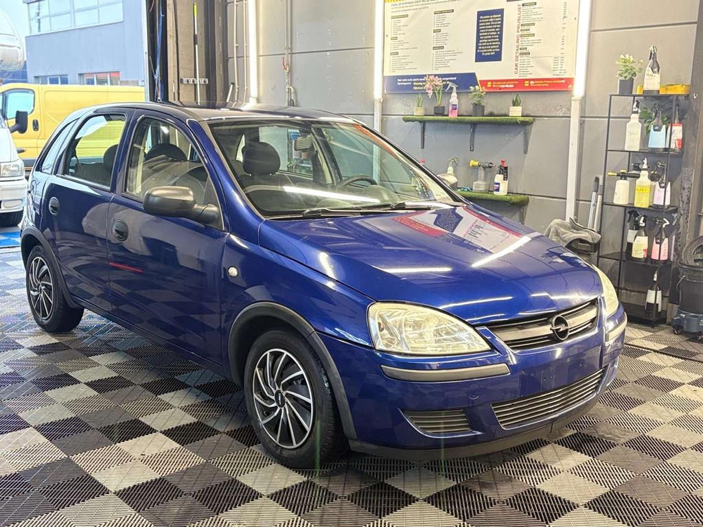 Opel Corsa 1.0 12V Cosmo, 59 pk, Gebruikt, Blauw, Bedrijf