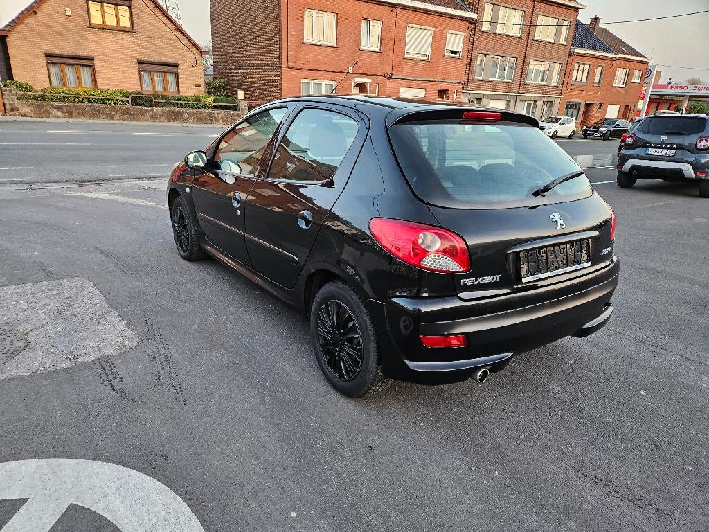 Peugeot 206+ 1.4hdi 2011euro5 clim tb.état roule impeccable, Auto's, Peugeot, Stof, 50 kW, Zwart, 99 g/km