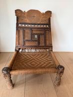 Lage Indische pidha stoel, Ophalen