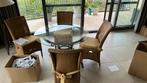 Glazen tafel met smeedijzer onderstel + 4 stoelen