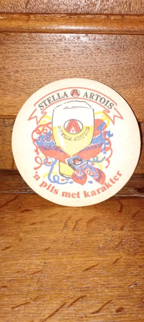 Brasserie oude bierstoofpot Stella Carnaval, Verzamelen, Biermerken, Gebruikt, Viltje(s), Stella Artois, Ophalen of Verzenden