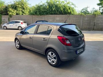 Opel Corsa 1.2 benzine 12/2011 met 83000km*GPS NAVIGATIE*PER, Auto's, Euro 5, Stof, 4 cilinders, Bruin