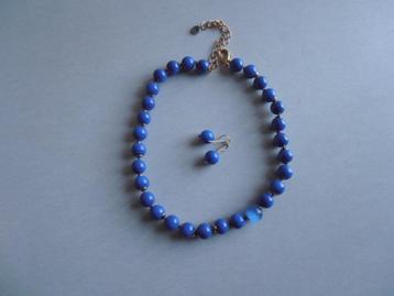Dames Halsketting Blauw Titto, Ophalen of Verzenden, Zo goed als nieuw, Blauw, Kunststof