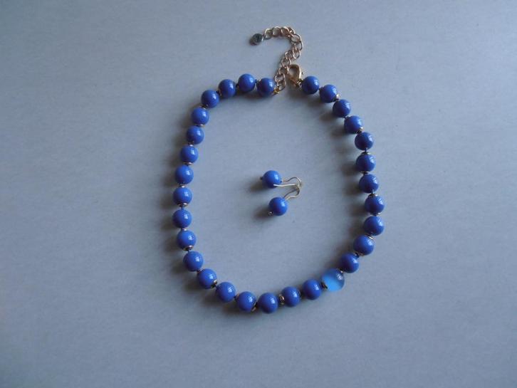 Dames Halsketting Blauw Titto, Handtassen en Accessoires, Kettingen, Zo goed als nieuw, Kunststof, Blauw, Ophalen of Verzenden