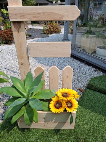 Nieuwe sterke houten bloembak voor binnen
Tot hoogte 1 m
Bre beschikbaar voor biedingen