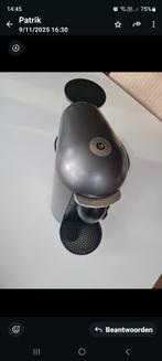 Nespresso koffieapparaat., Enlèvement