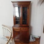 Boekenkast vitrinekast, Ophalen